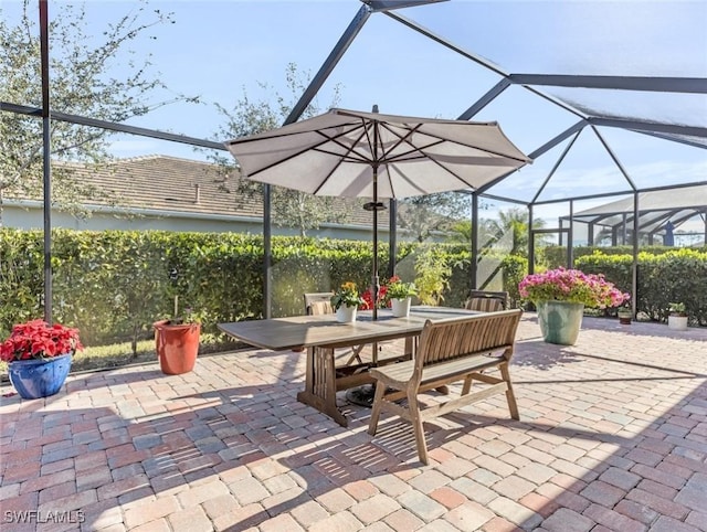 view of patio / terrace with glass enclosure