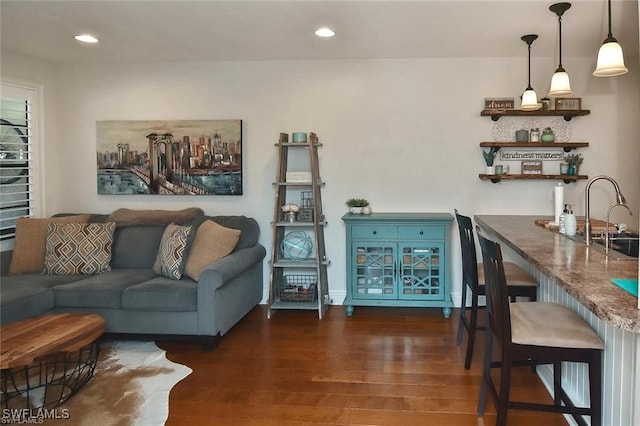 living room with dark hardwood / wood-style floors