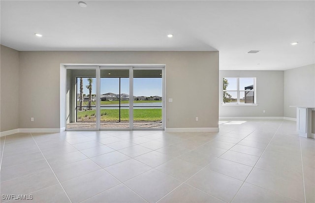 spare room with light tile patterned flooring