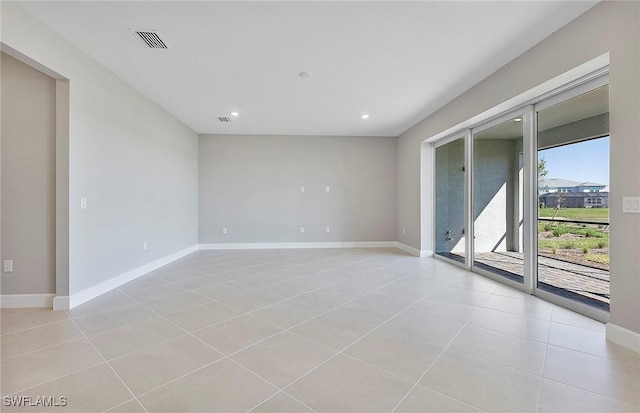 view of tiled spare room