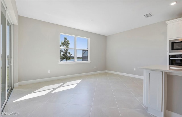 view of tiled empty room