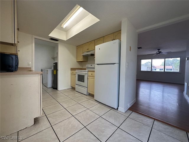 kitchen featuring white appliances, ceiling fan, and light tile patterned flooring