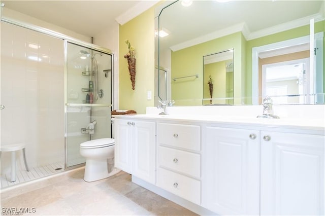 bathroom featuring ornamental molding, an enclosed shower, and vanity