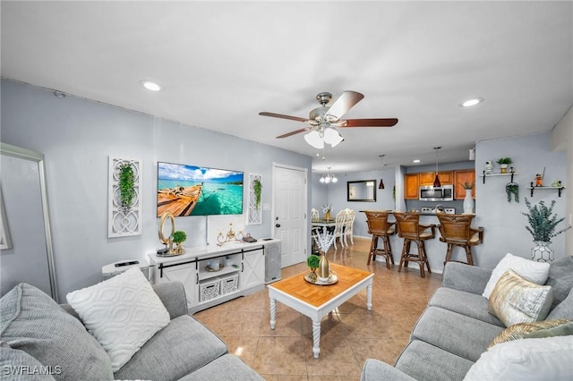 tiled living room with ceiling fan