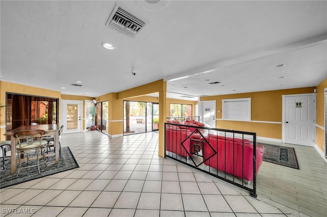 interior space with light tile patterned floors