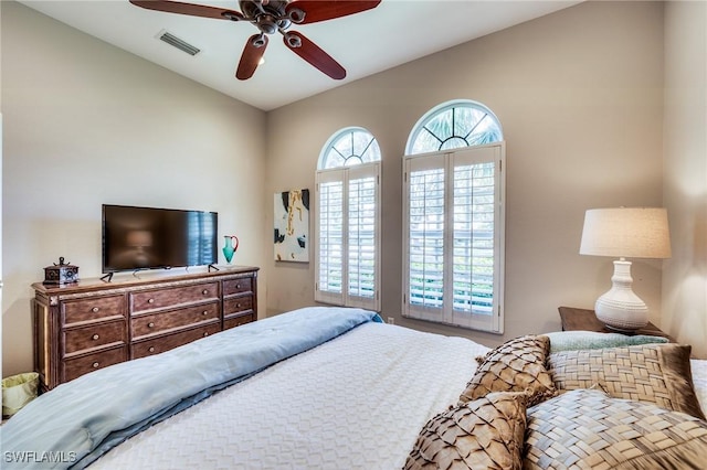 bedroom featuring vaulted ceiling and ceiling fan