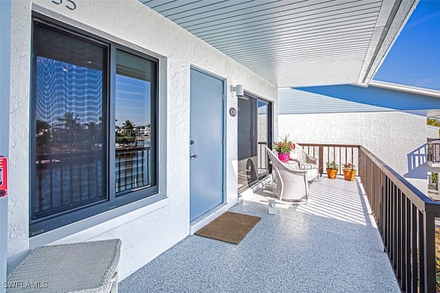 balcony featuring a sunroom