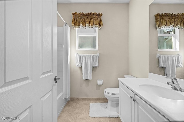 bathroom featuring a shower with curtain, vanity, toilet, and tile patterned flooring