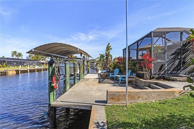 view of dock featuring a lanai and a water view