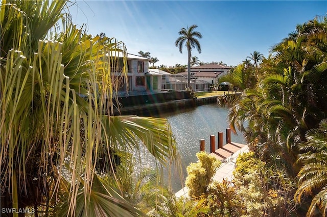 property view of water featuring a boat dock