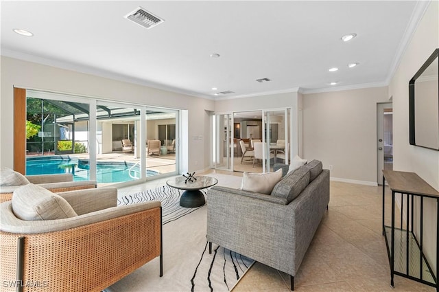 living room with crown molding and light tile patterned floors