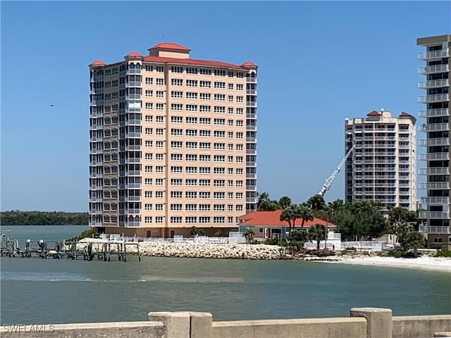 view of building exterior with a water view