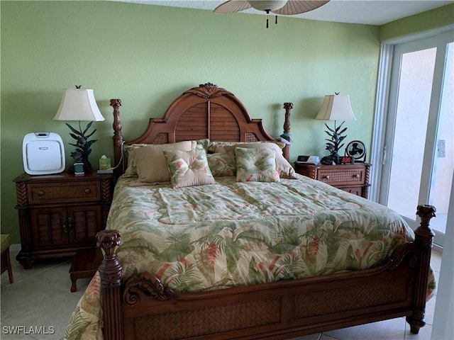 tiled bedroom with ceiling fan