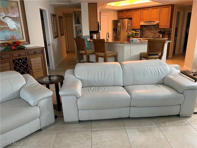 tiled living room with sink