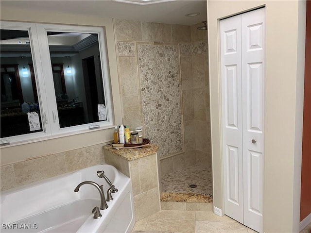 bathroom with separate shower and tub