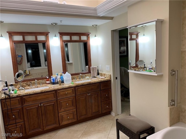 bathroom with tile patterned flooring and vanity