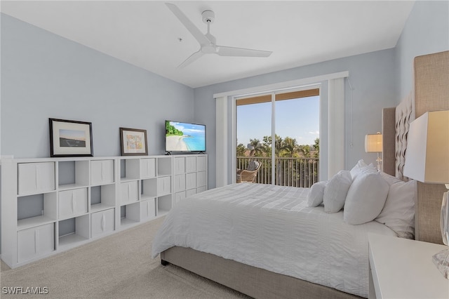 carpeted bedroom with access to outside and ceiling fan