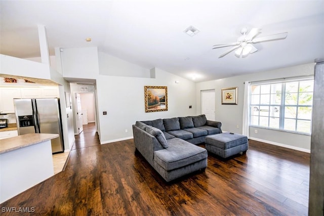 501 NE 24th Ter, Cape Coral, FL 33909 - living room featuring dark wood-type flooring, vaulted ceiling, and ceiling fan