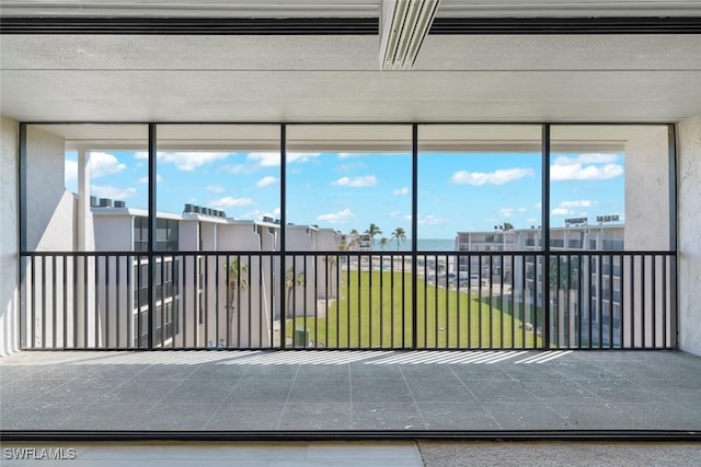 unfurnished sunroom featuring a healthy amount of sunlight