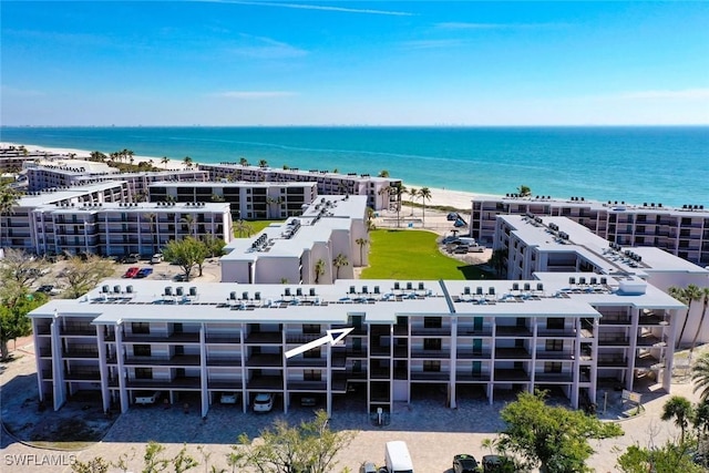 aerial view with a beach view and a water view