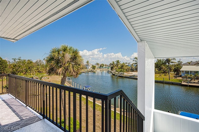 balcony featuring a water view