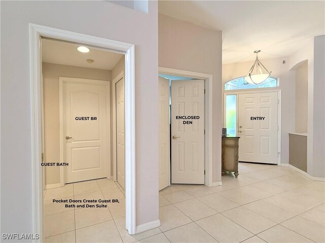 8744 Naples Heritage Dr Unit E28, Naples, FL 34112 - foyer entrance featuring light tile patterned flooring
