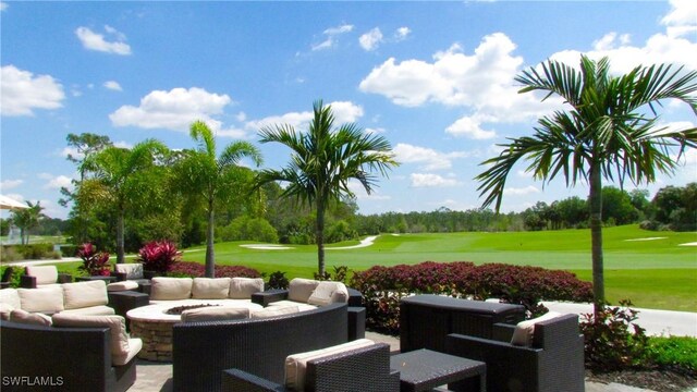 8744 Naples Heritage Dr Unit E28, Naples, FL 34112 - view of property's community with a lawn