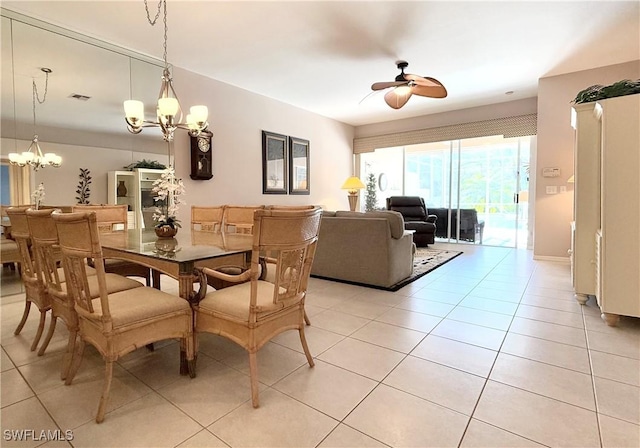 8744 Naples Heritage Dr Unit E28, Naples, FL 34112 - tiled dining space featuring ceiling fan with notable chandelier