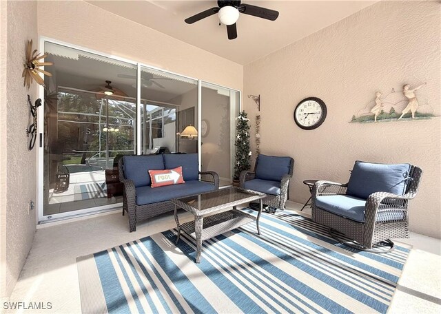 8744 Naples Heritage Dr Unit E28, Naples, FL 34112 - view of patio with ceiling fan, outdoor lounge area, and glass enclosure