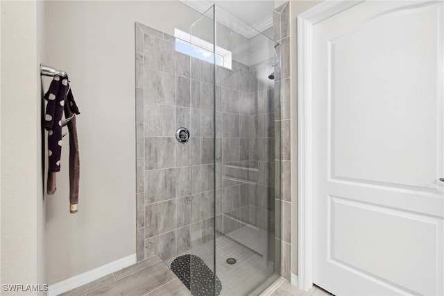 bathroom featuring tiled shower