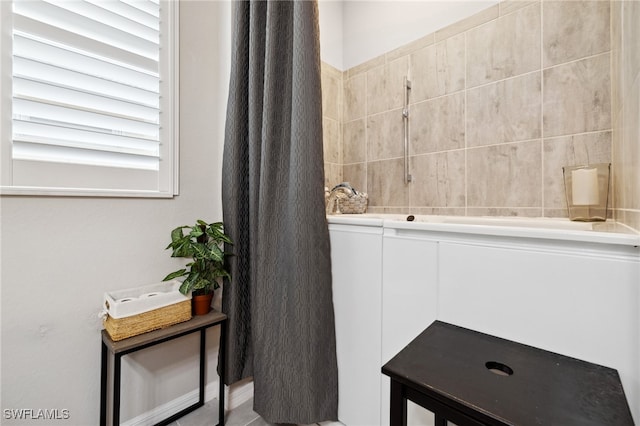 bathroom featuring a shower