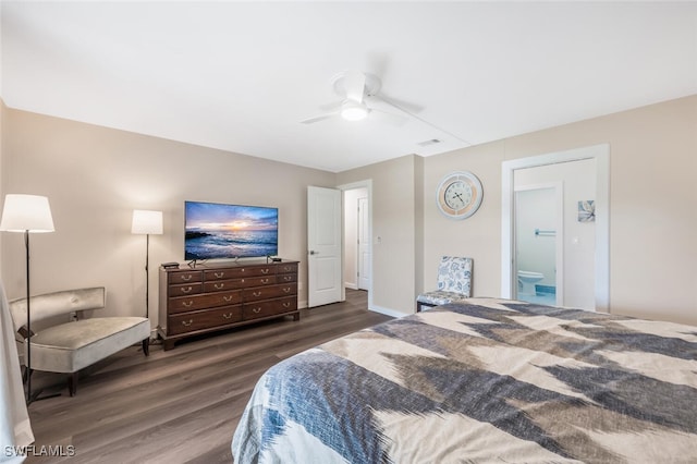 bedroom featuring ceiling fan, ensuite bathroom, and dark hardwood / wood-style flooring