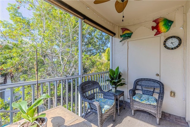 sunroom / solarium with ceiling fan