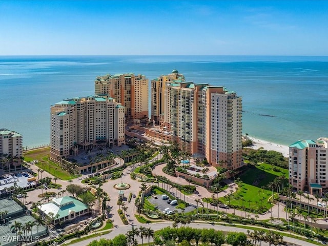 bird's eye view with a beach view and a water view