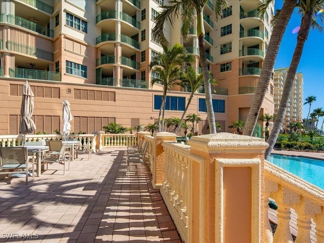 view of swimming pool featuring a patio area