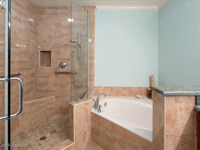 bathroom with ornamental molding and plus walk in shower