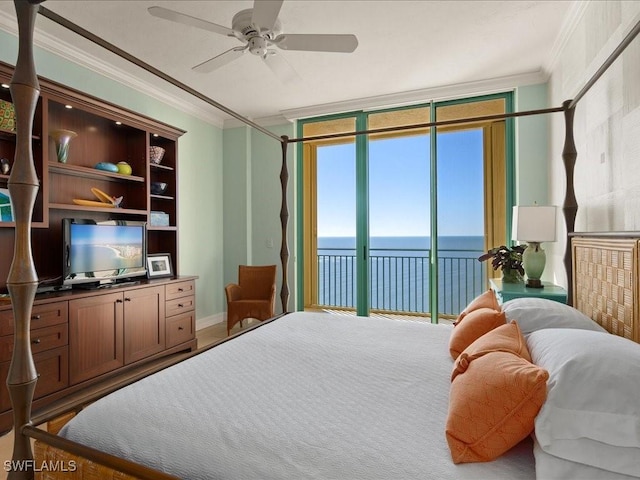 bedroom with a water view, a wall of windows, crown molding, and access to outside