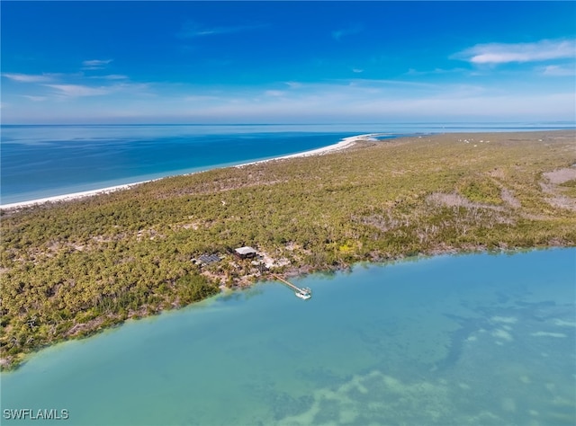 birds eye view of property featuring a view of the beach and a water view