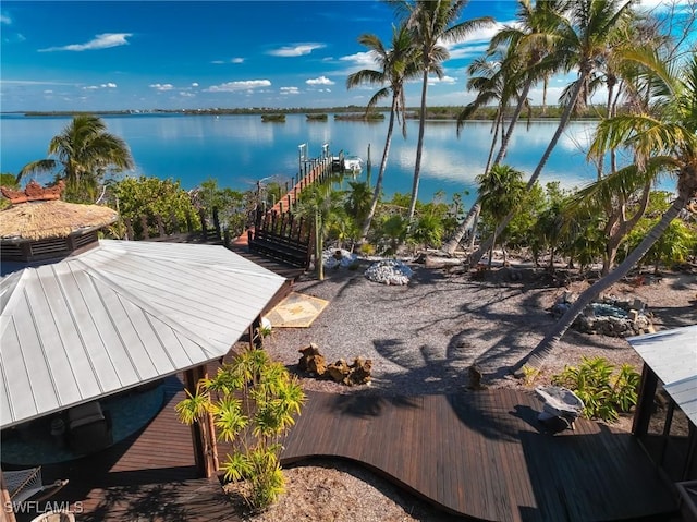 view of water feature with a dock