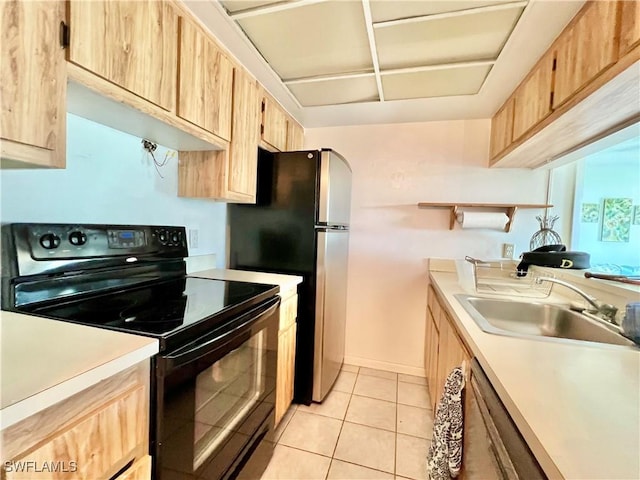 kitchen with sink, light tile patterned floors, stainless steel appliances, and light brown cabinets