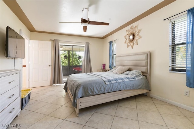 bedroom featuring ornamental molding, access to outside, light tile patterned floors, and ceiling fan