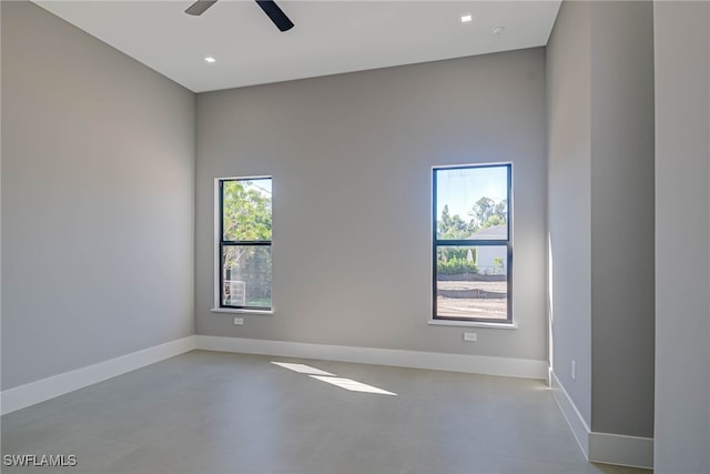 unfurnished room featuring ceiling fan