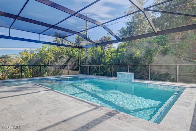 view of pool featuring a lanai and a patio