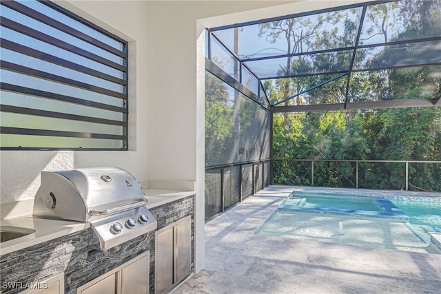 view of patio / terrace featuring an outdoor kitchen and area for grilling