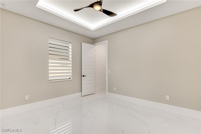 unfurnished room featuring ceiling fan