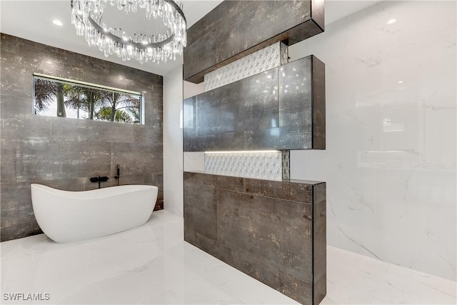 bathroom with a bathing tub and tile walls