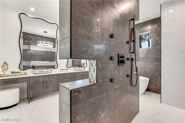 bathroom featuring vanity and separate shower and tub