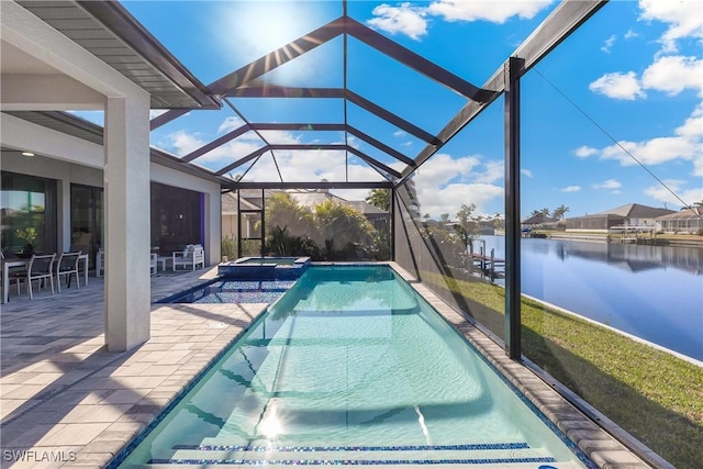 view of swimming pool featuring an in ground hot tub, a water view, glass enclosure, and a patio