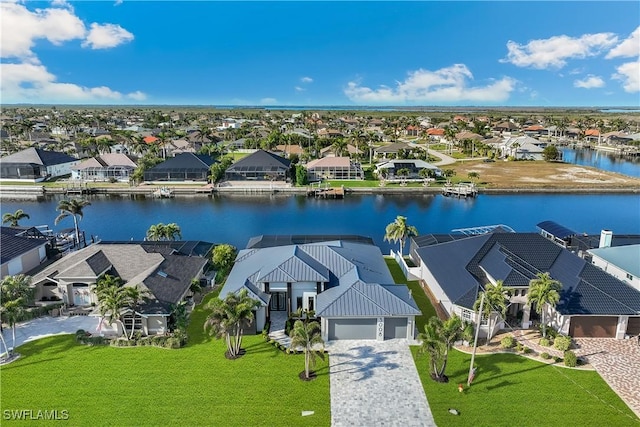 drone / aerial view featuring a water view