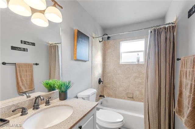 full bathroom featuring vanity, shower / tub combo, and toilet